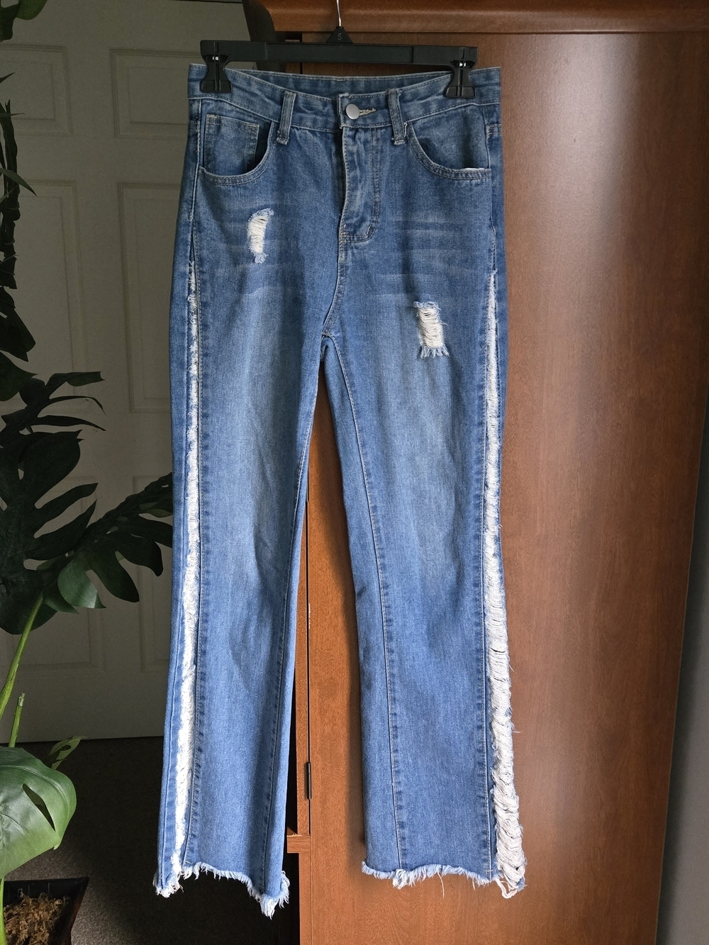 Distressed Boot-Cut Jeans with Frayed Side Stripes